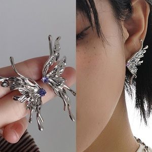 Liquid metal butterfly earrings asymmetric purple zirconia